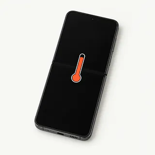 Samsung Galaxy Z Flip8 opened flat, with an orange-red thermometer symbol on the black inner screen