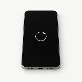 Phone face up with a silver frame and a white restart arrow in the center of its black screen