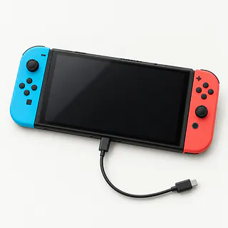 Nintendo Switch OLED with blue and red controllers, front view with a dark screen and charging cable plugged in
