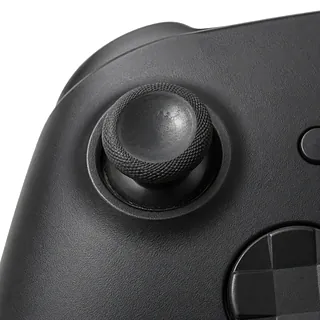 Xbox Wireless Controller in black, front close-up with a worn left analog stick and grime around its base
