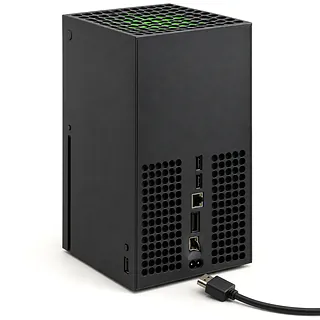 Xbox Series X in black, rear view with a bent HDMI port and an unplugged HDMI cable beside it